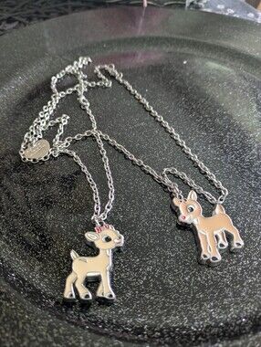 52. Two Reindeer Necklaces ($5/3for$12/Freewith$50purchase)